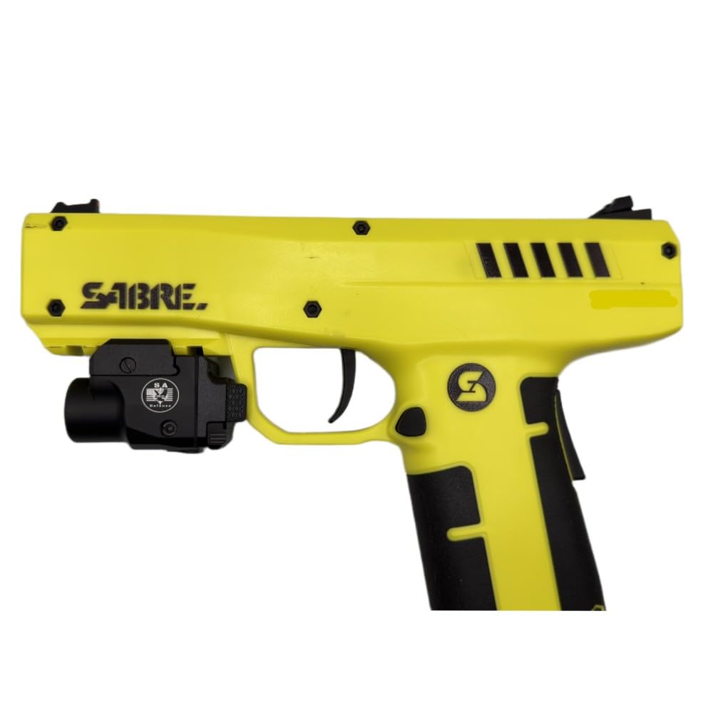 Green laser beam from S.A. Self Defense device aligned for precise aiming