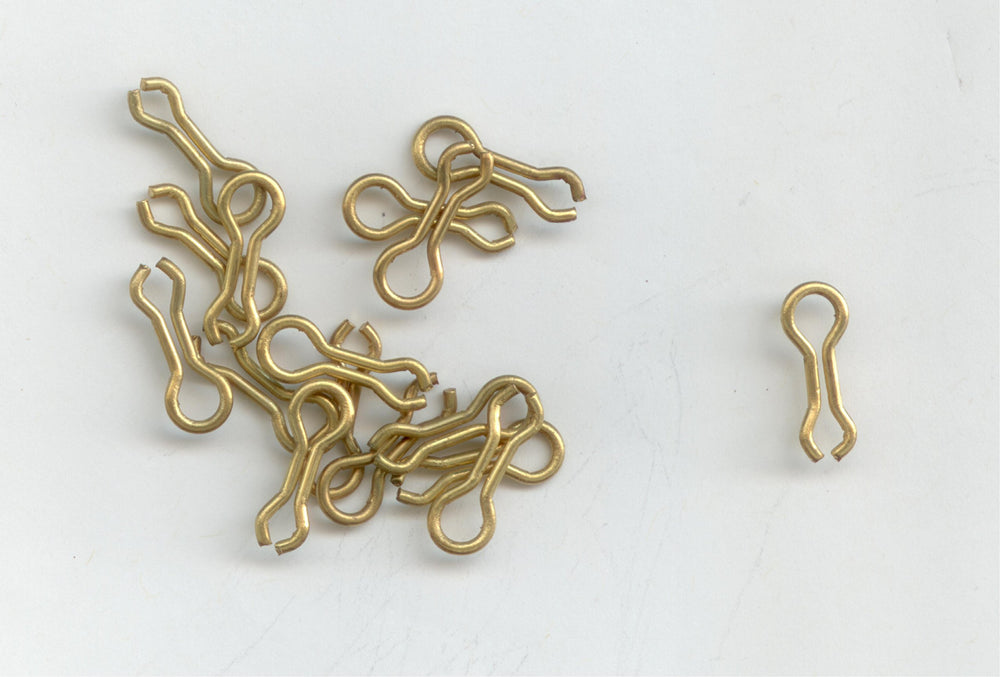 S J's TACKLE BOX brass sinker wire eye for Do-It molds; durable and reliable rig component.
