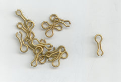 S J's TACKLE BOX brass sinker wire eye for Do-It molds; durable and reliable rig component.