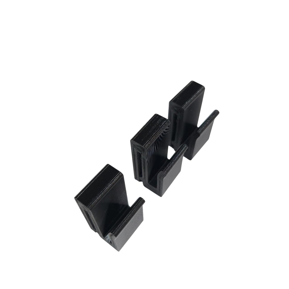 Saddle Hunting Molle Clip Set 3: black close-up of a sturdy clip for 1-inch molle systems