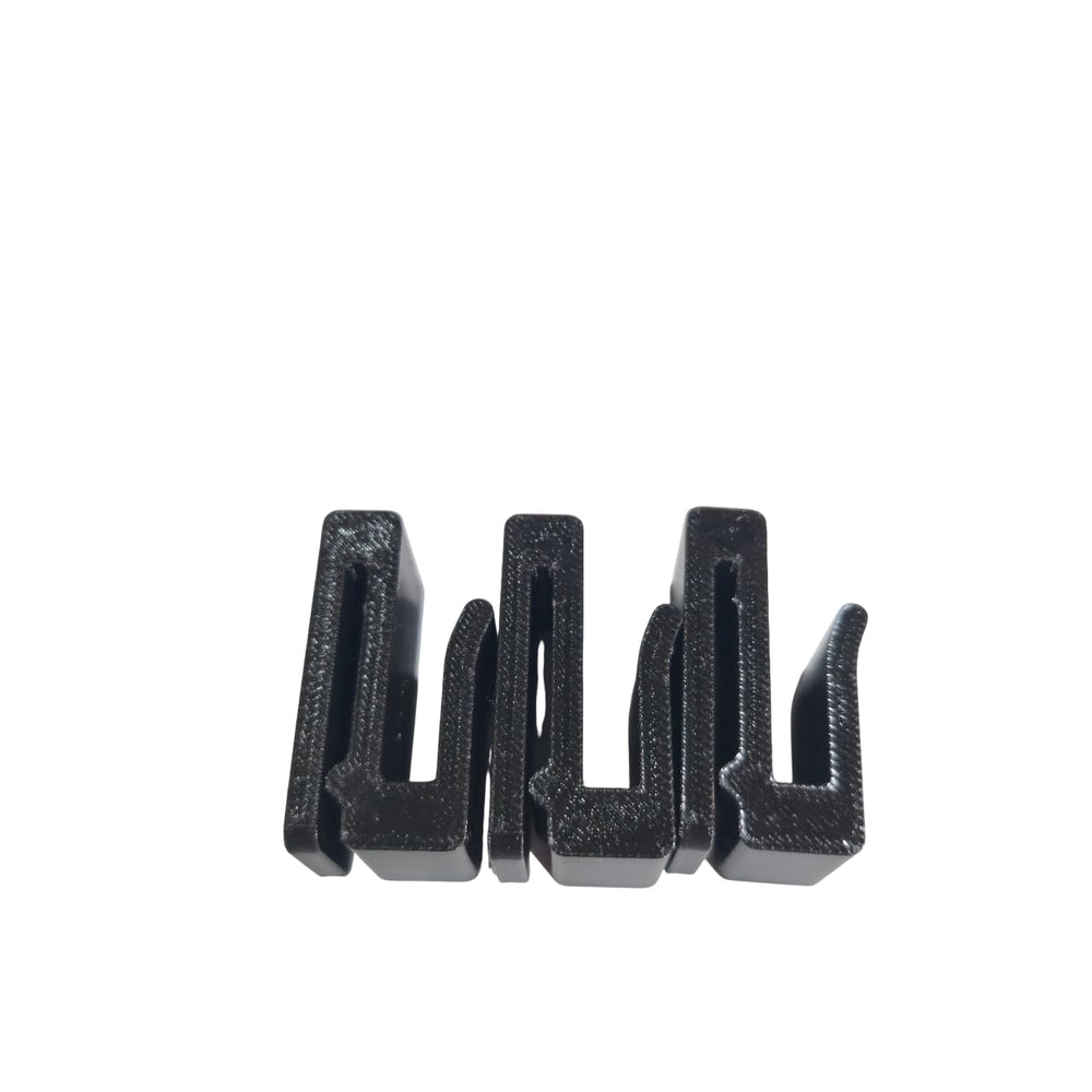 Saddle Hunting Molle Clip Set 3 in use, securing bino and rangefinder during climbs