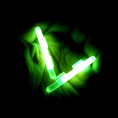 Close-up of glow sticks showing dimensions 2.7x3.2mm