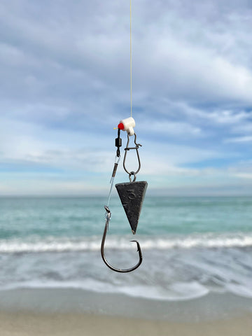 Salt Tide 100lb mono spool on a rig ready for heavy surf