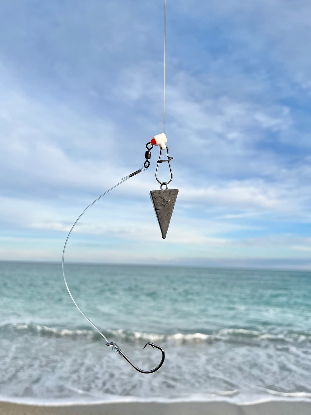 Salt Tide Fishing bead and sinker slide included for quick rig adjustments.