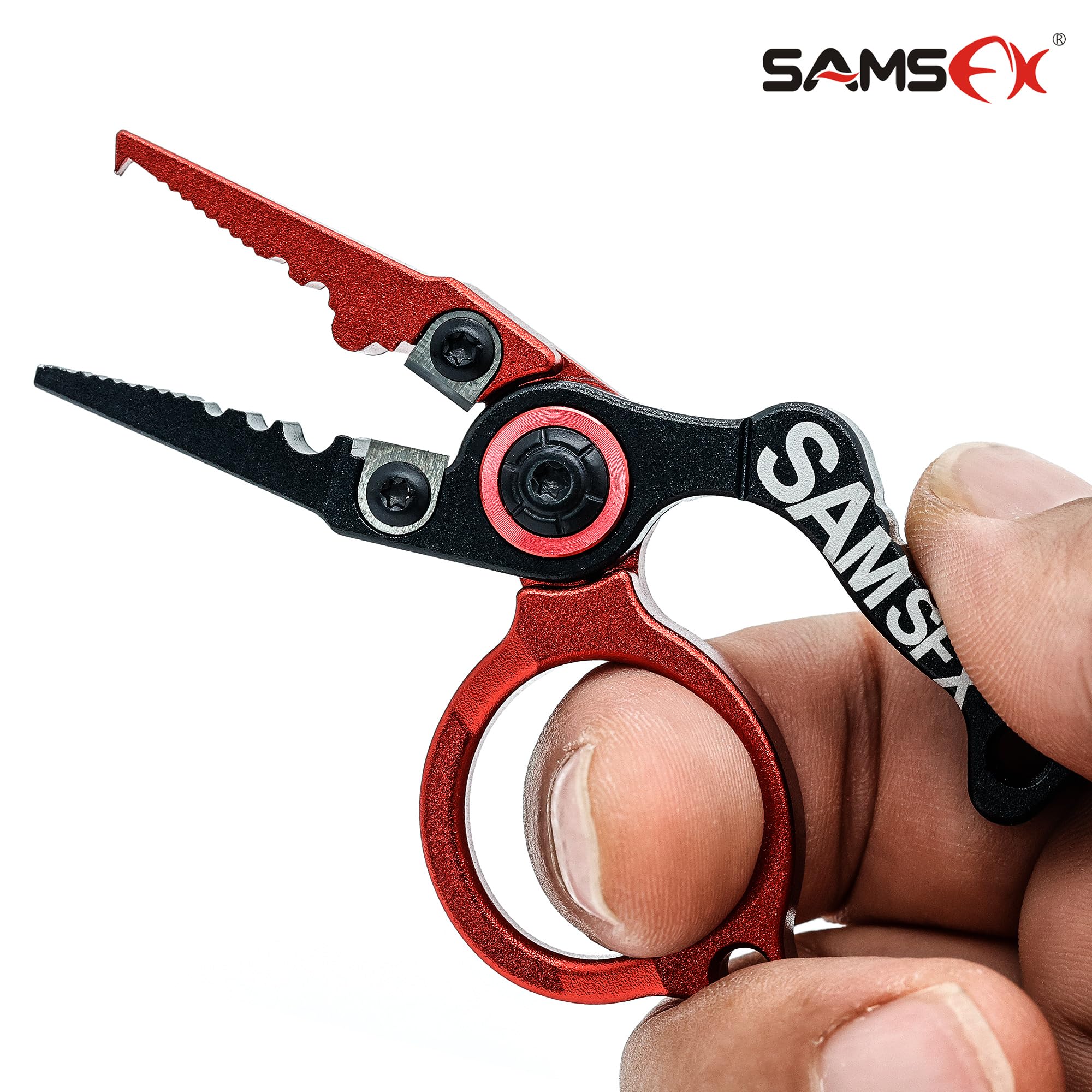 Retractor tether attached to compact fishing pliers