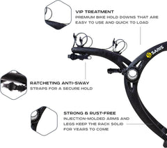 Saris Bones trunk rack anti-sway straps securing two bikes during transit.