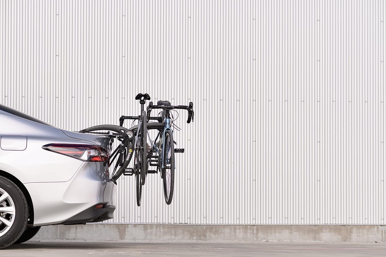 Saris Bones trunk rack uses injection-molded arms for durable performance.