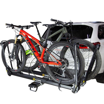 Saris MHS built-in cable lock secures the bike to the rack.