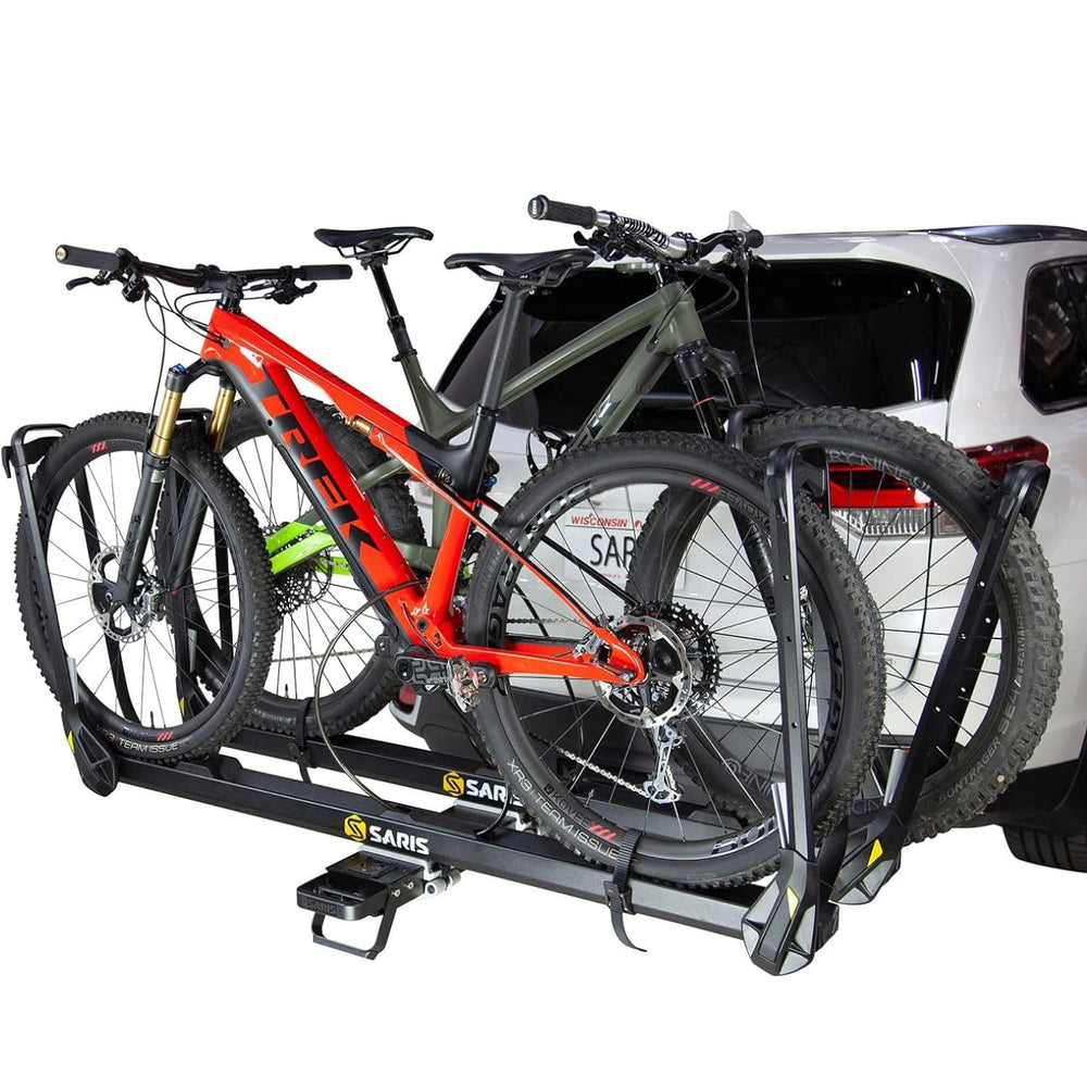 Saris MHS built-in cable lock secures the bike to the rack.
