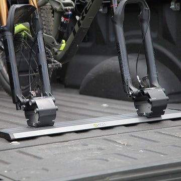 Saris Thru Axle Traps close-up showing sturdy fork mount design.