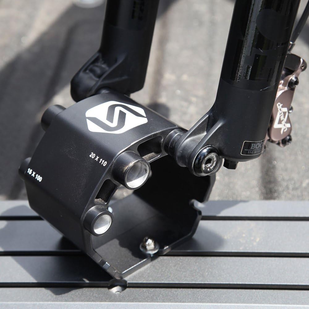 Saris Thru Axle Traps in a compact storage configuration saving space.