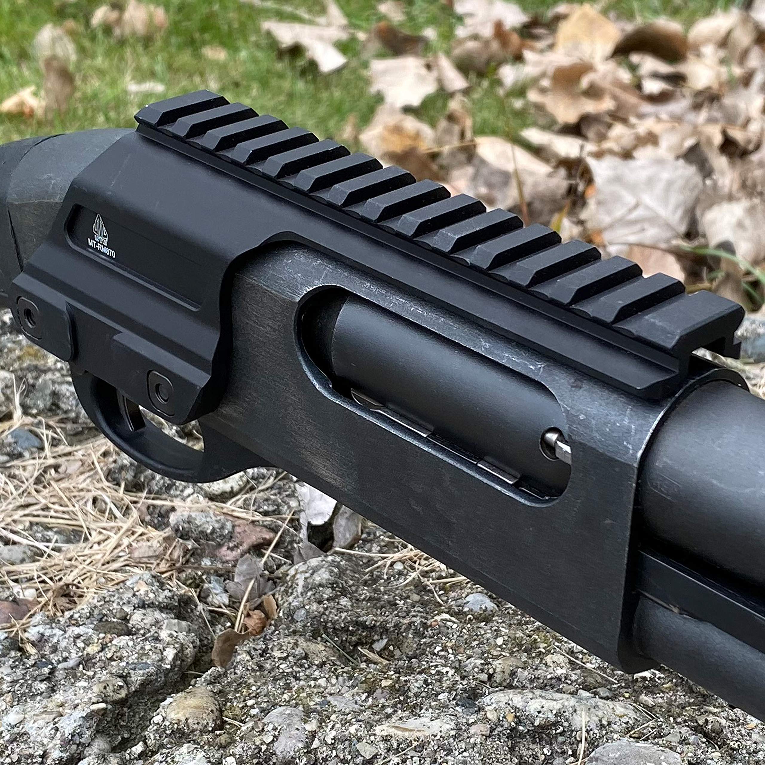 Scalloped full-length Picatinny top rail on UTG mount