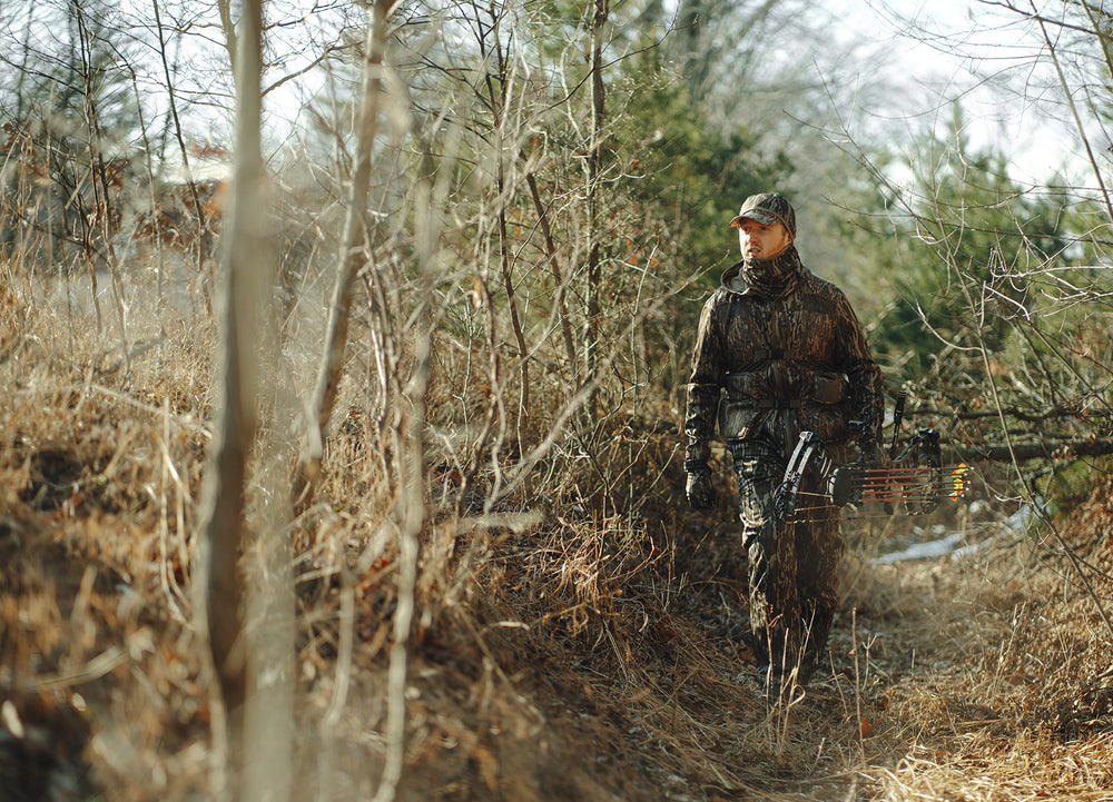 SCENTBLOCKER Shield Series Silentec pants camo pattern close-up in Mossy Oak Bottomland.