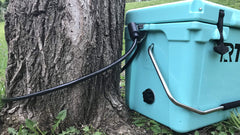 Yeti Roadie20 bracket secures the cooler while preserving handle movement.