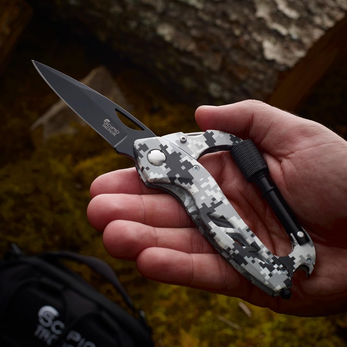 Scipio twist closure carabiner lock secures the knife during transport.