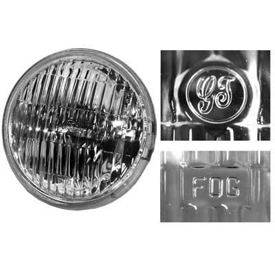 Scott Drake GT Script 4in clear fog lamp highlights original lens markings for authentic restoration.
