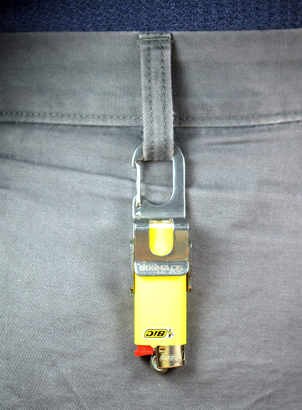 Screwpop clip attached to belt loop for hands-free access.