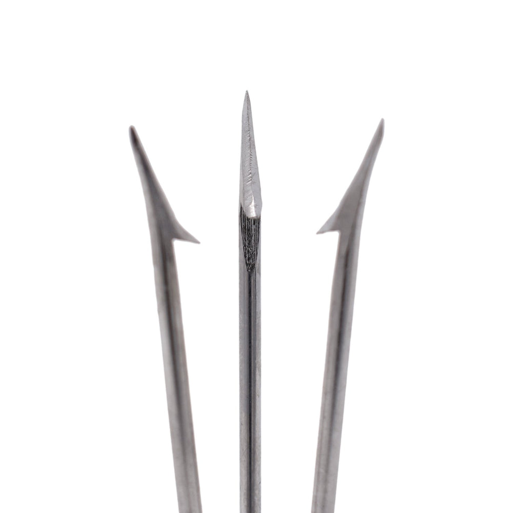 Scuba Choice cold-water spear use demonstrating tip in action during winter ice fishing scene