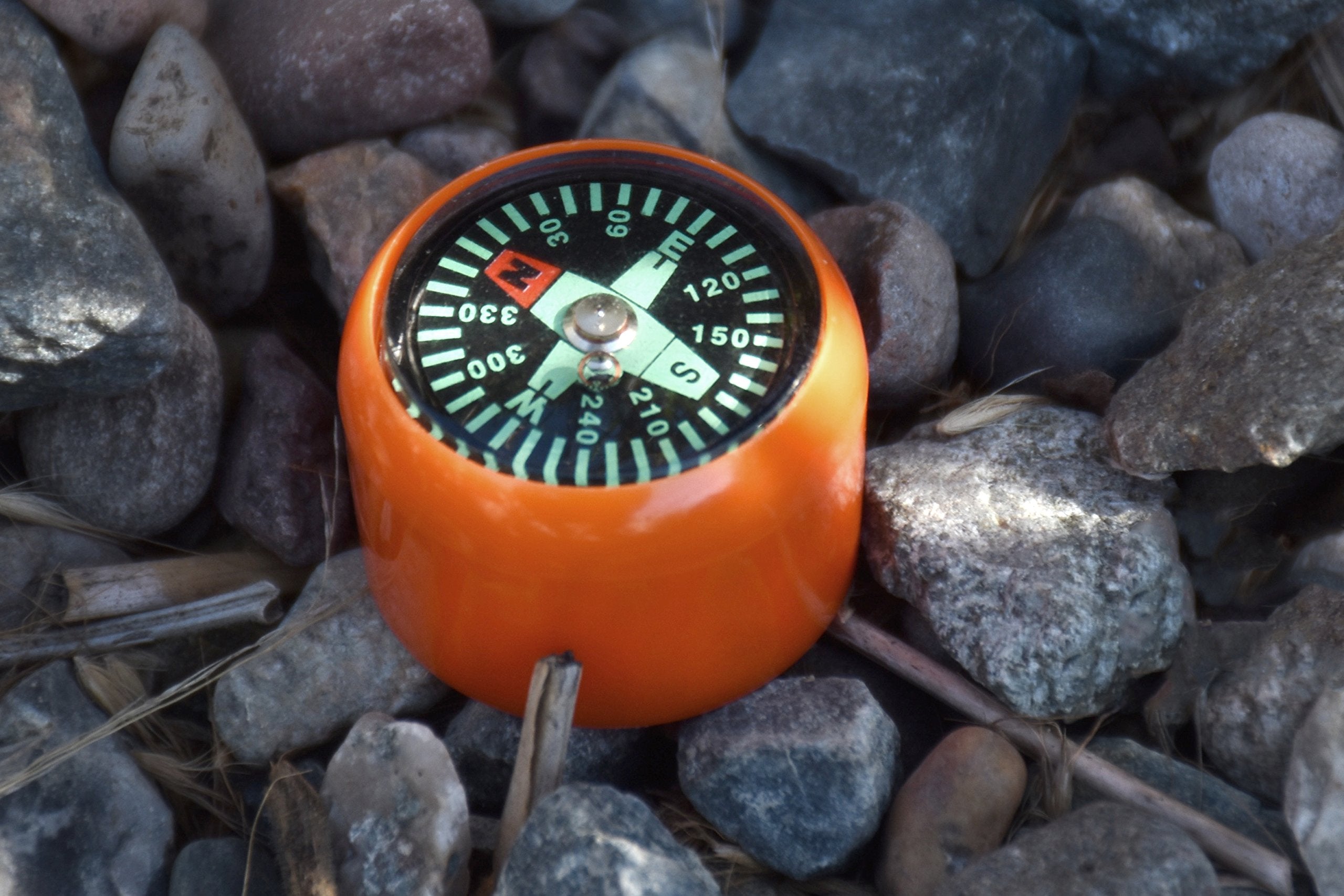 SE bright orange body makes the survival whistle easy to spot in gear.