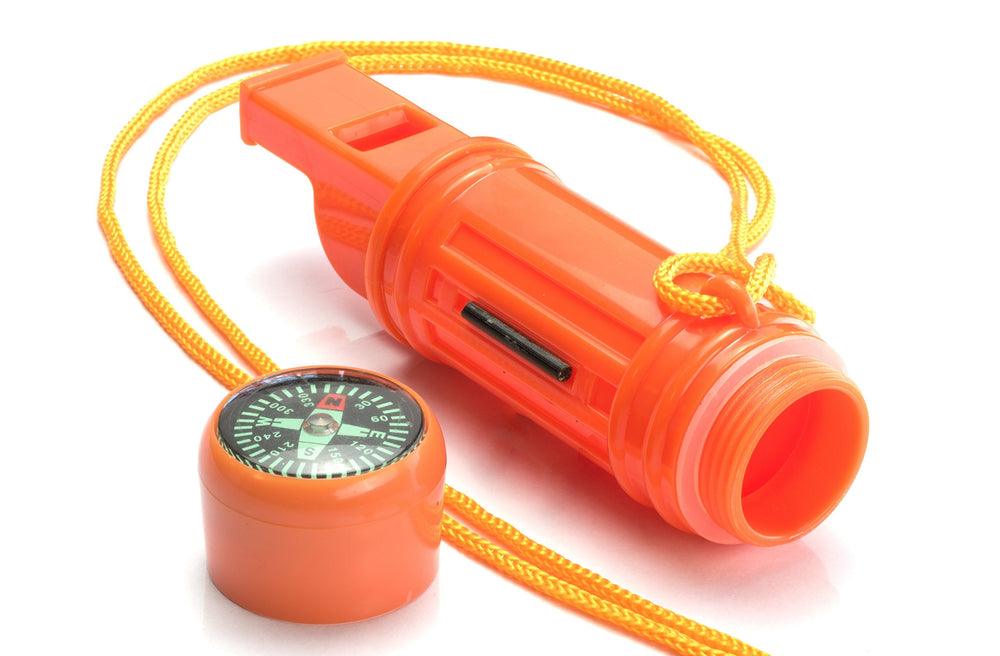 SE 5-in-1 orange survival whistle with compass for quick emergency signaling during hikes.