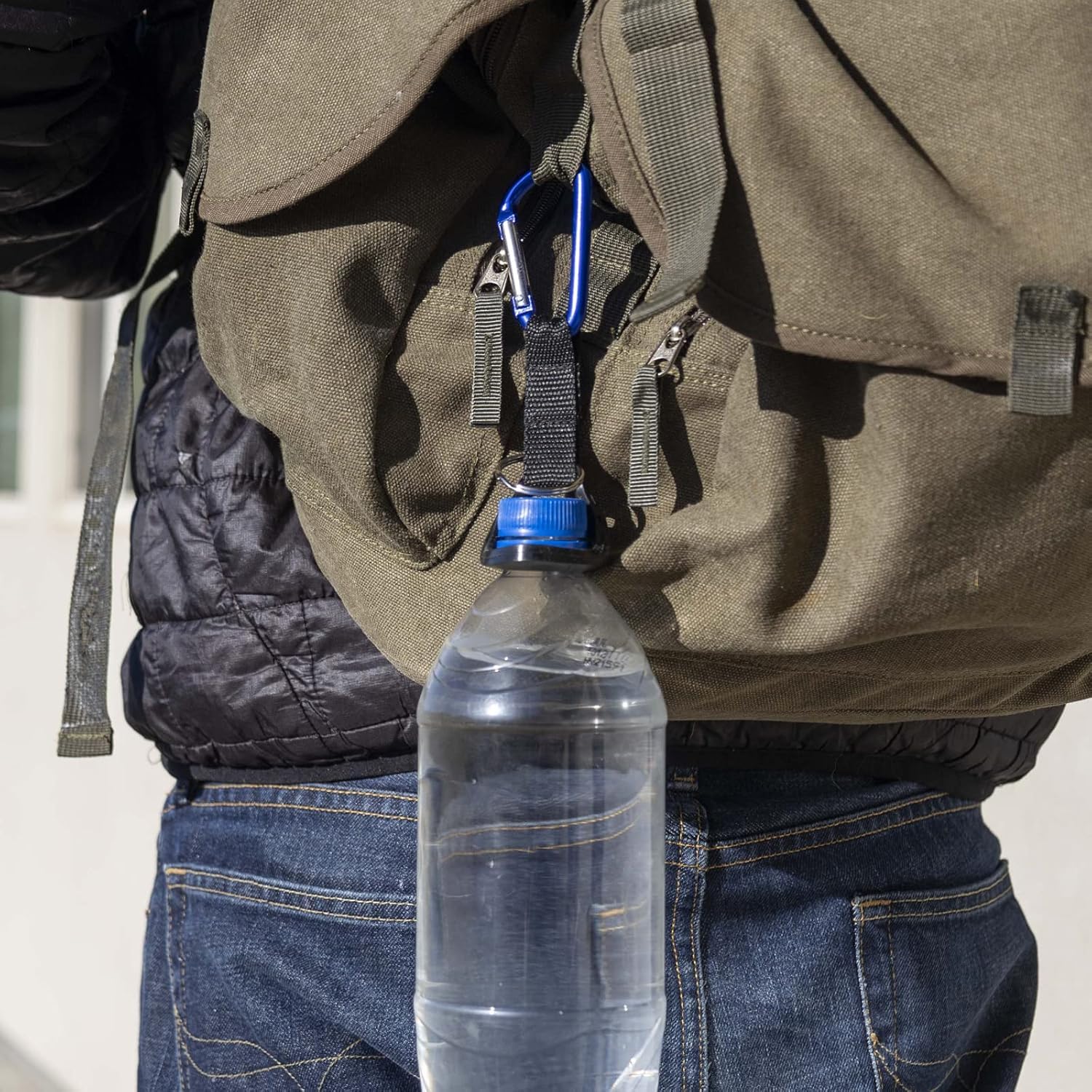 SE bottle holder lets you sip from your bottle without removing the holder.