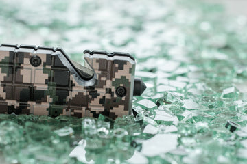 SE Desert digital camo design close-up on rugged knife finish.