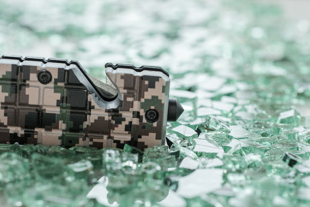 SE Desert digital camo design close-up on rugged knife finish.