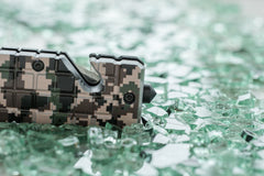 SE Desert digital camo design close-up on rugged knife finish.