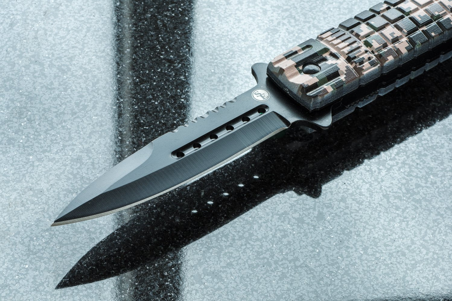 SE Folding knife with clip attachment for easy access on gear.