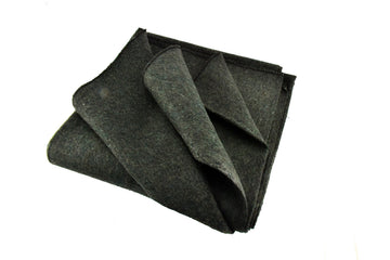 SE Green blanket folded for compact warmth on the go.