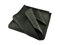 SE Green blanket folded for compact warmth on the go.