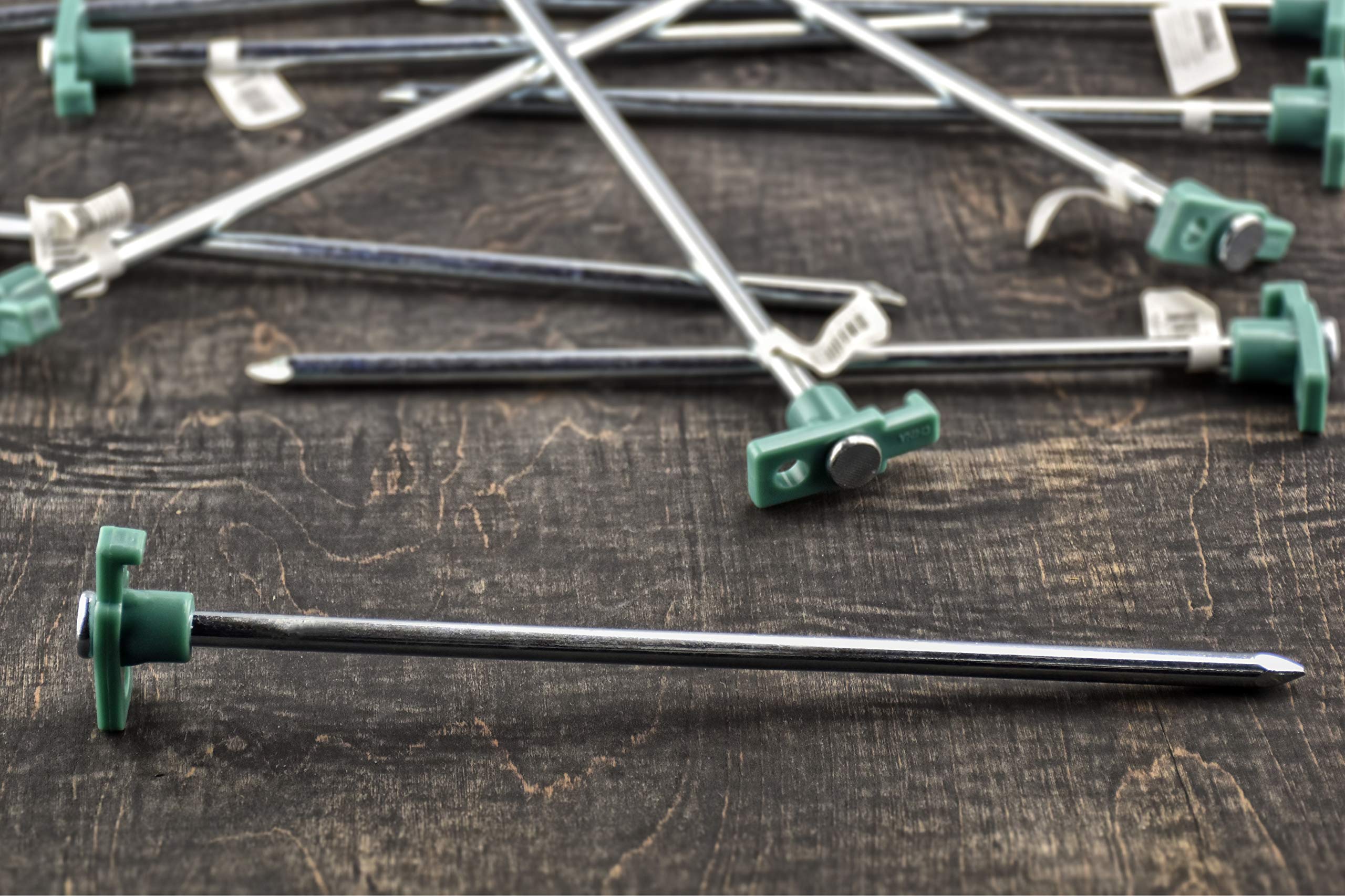 SE heavy-duty tent pegs in dirt demonstrate secure anchoring