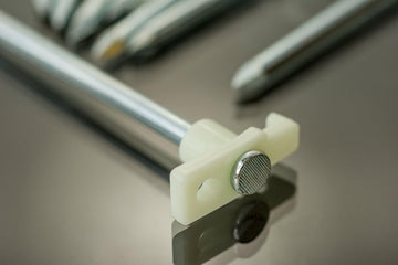 SE glow-in-the-dark feature visible after sun exposure aids locating stakes.
