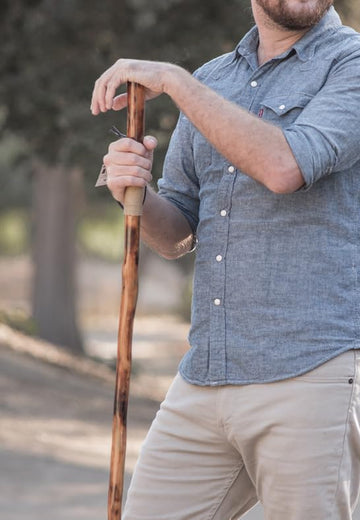 SE Survivor 55-inch hiking stick offers stable support on trails