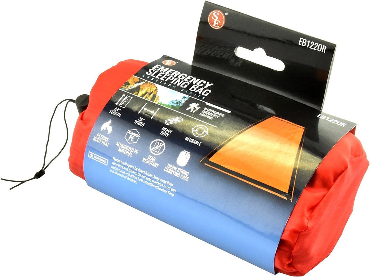 SE Survivor Series Emergency Sleeping Bag EB122OR with drawstring carry case, ideal for quick shelter.