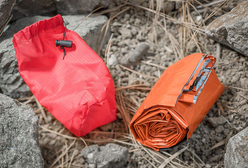 SE Survivor orange carrying pouch with drawstring closure for secure storage