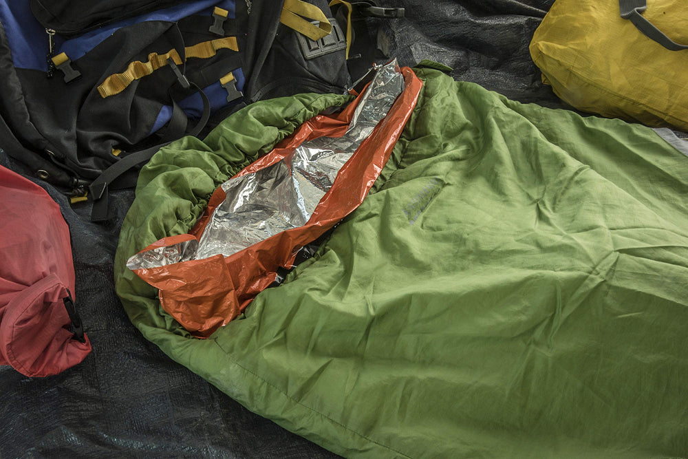 SE Survivor orange dimensions 3 ft by 7 ft suitable for diverse activities