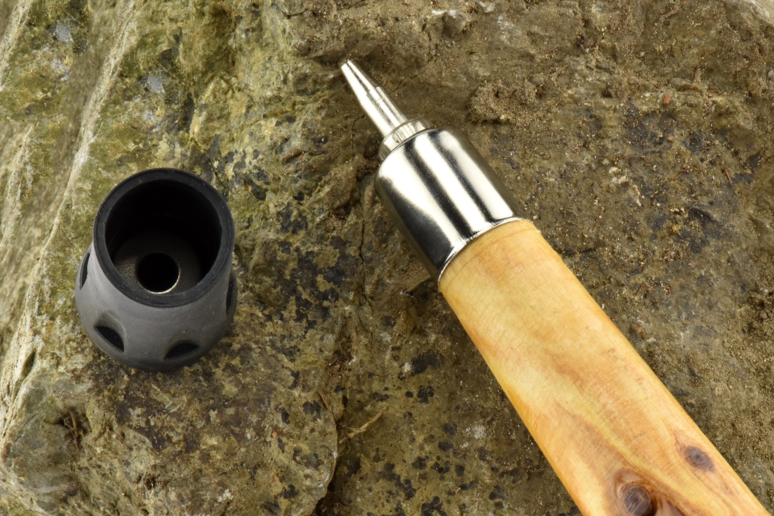 SE Survivor reinforced rubber tip offers durable grip on damp trails.