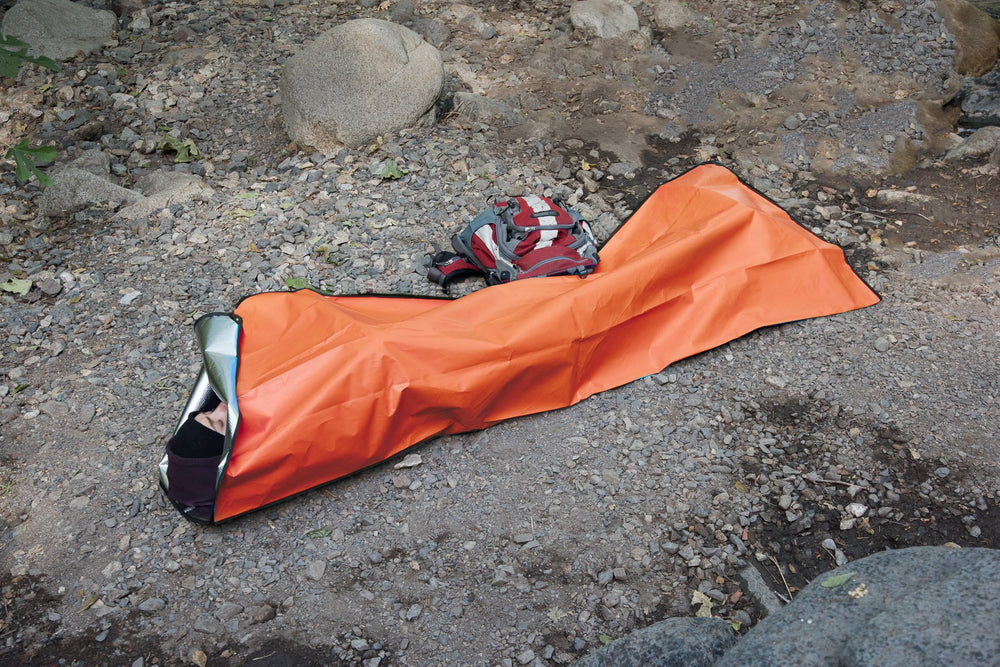 SE Survivor Series blanket with stakes keeps it secure on windy ground