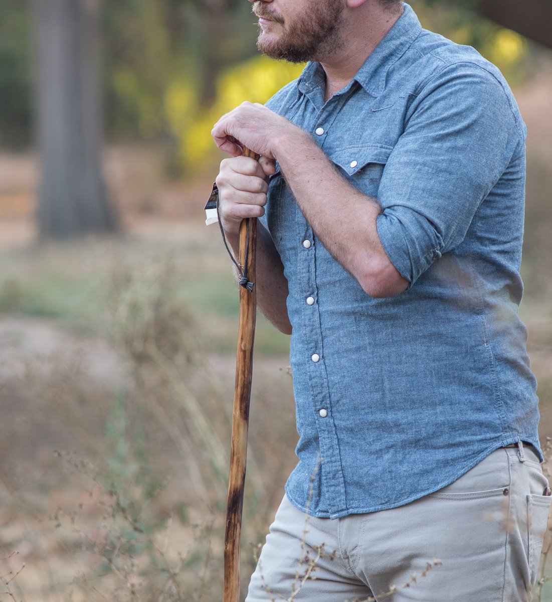 SE Survivor weatherproof finish protects the stick from sun and rain during hikes.