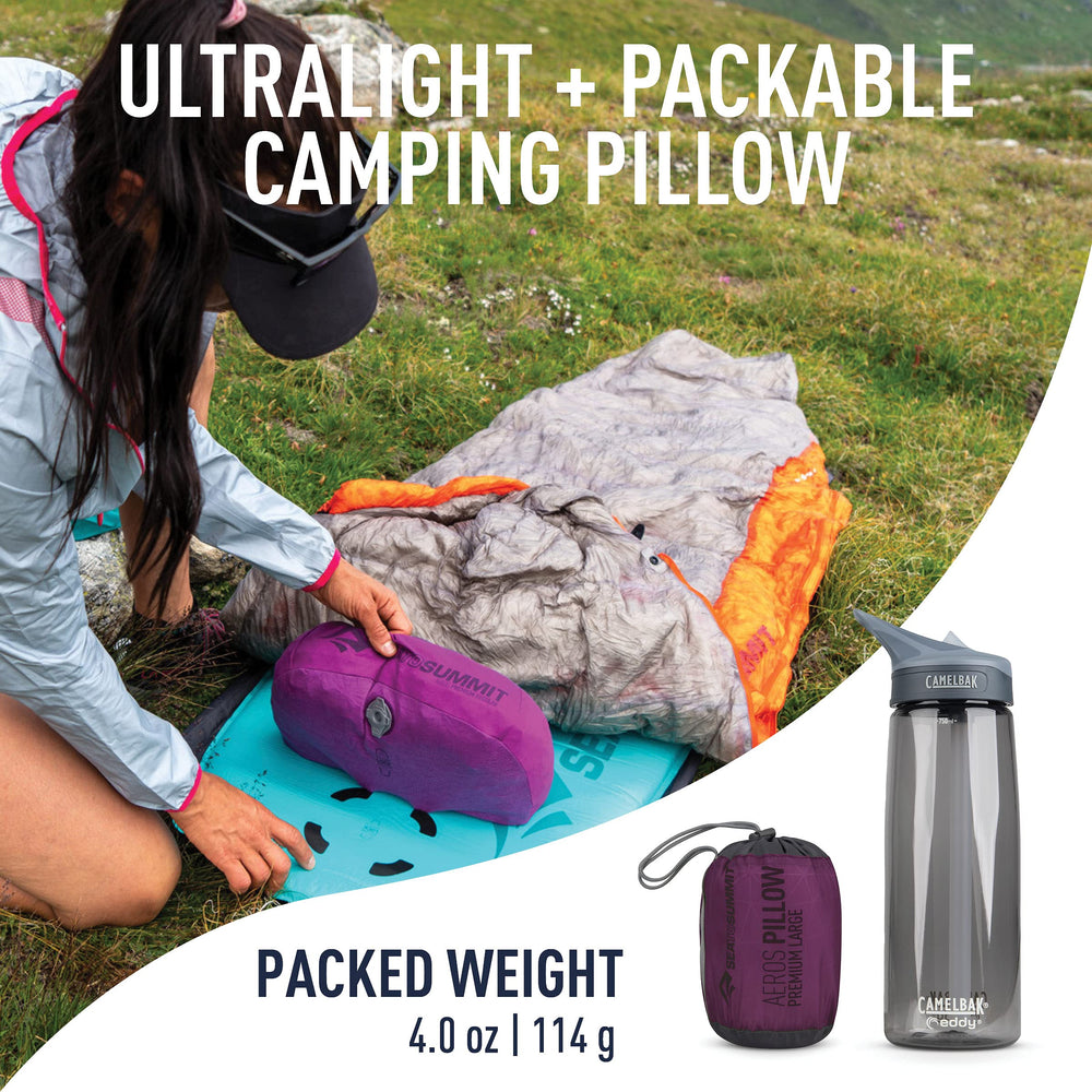 Sea to Summit Aeros Large Magenta pillow in use for neck support on travel