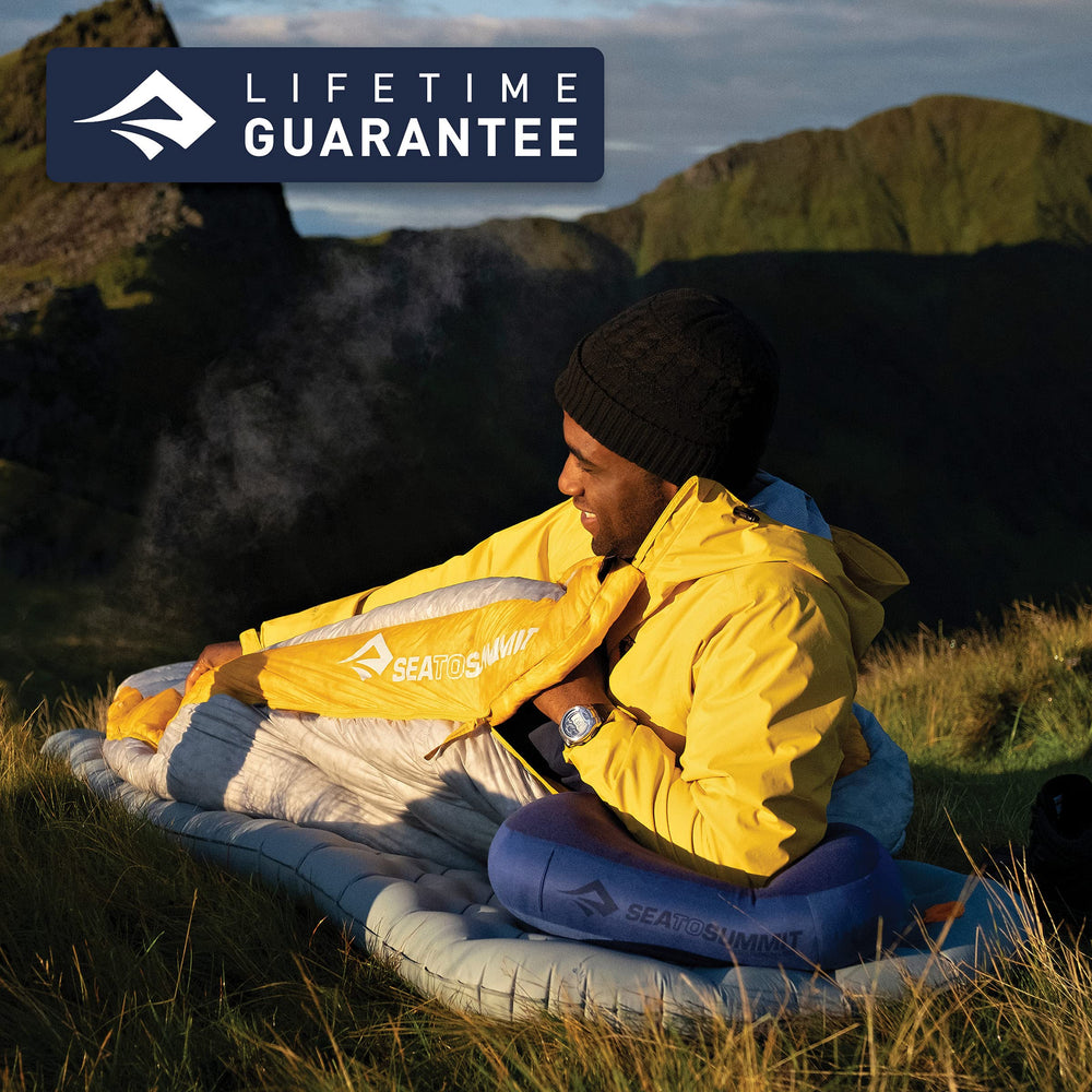 Sea to Summit Aeros Premium inflatable travel pillow moisture-resistant fabrics shown in travel scenario