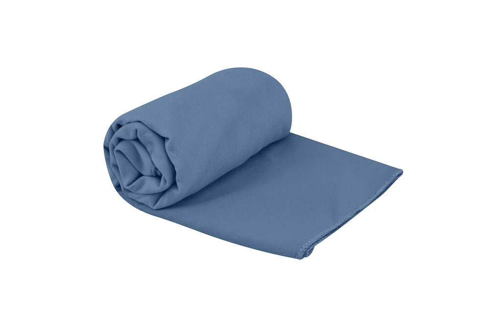 Sea to Summit Drylite towel folded in Moonlight Blue for compact travel.