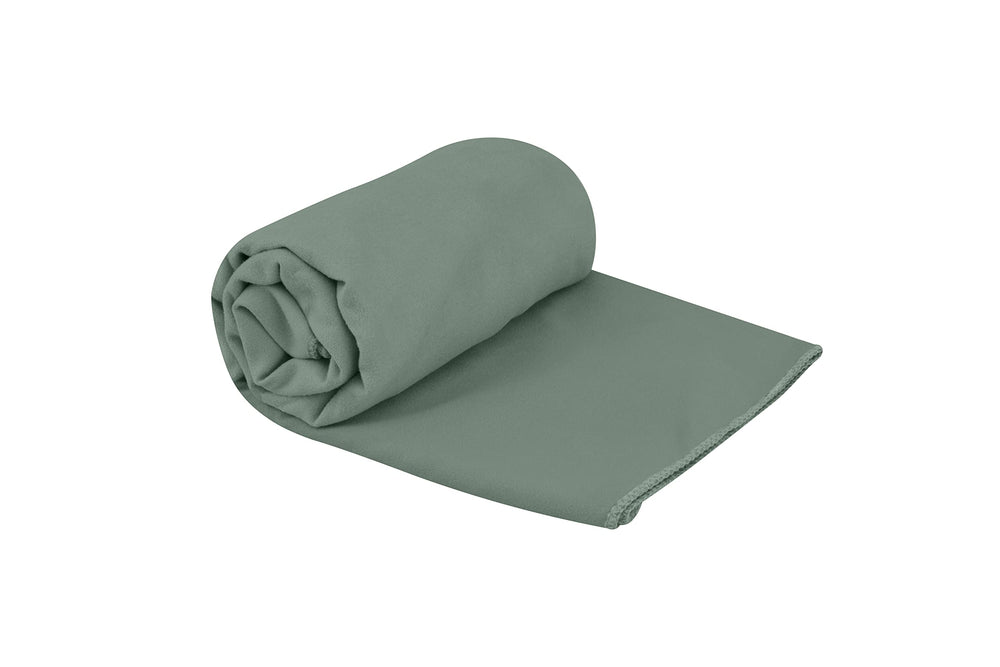 Sea to Summit Drylite Towel folded in Sage Green for compact travel packing.