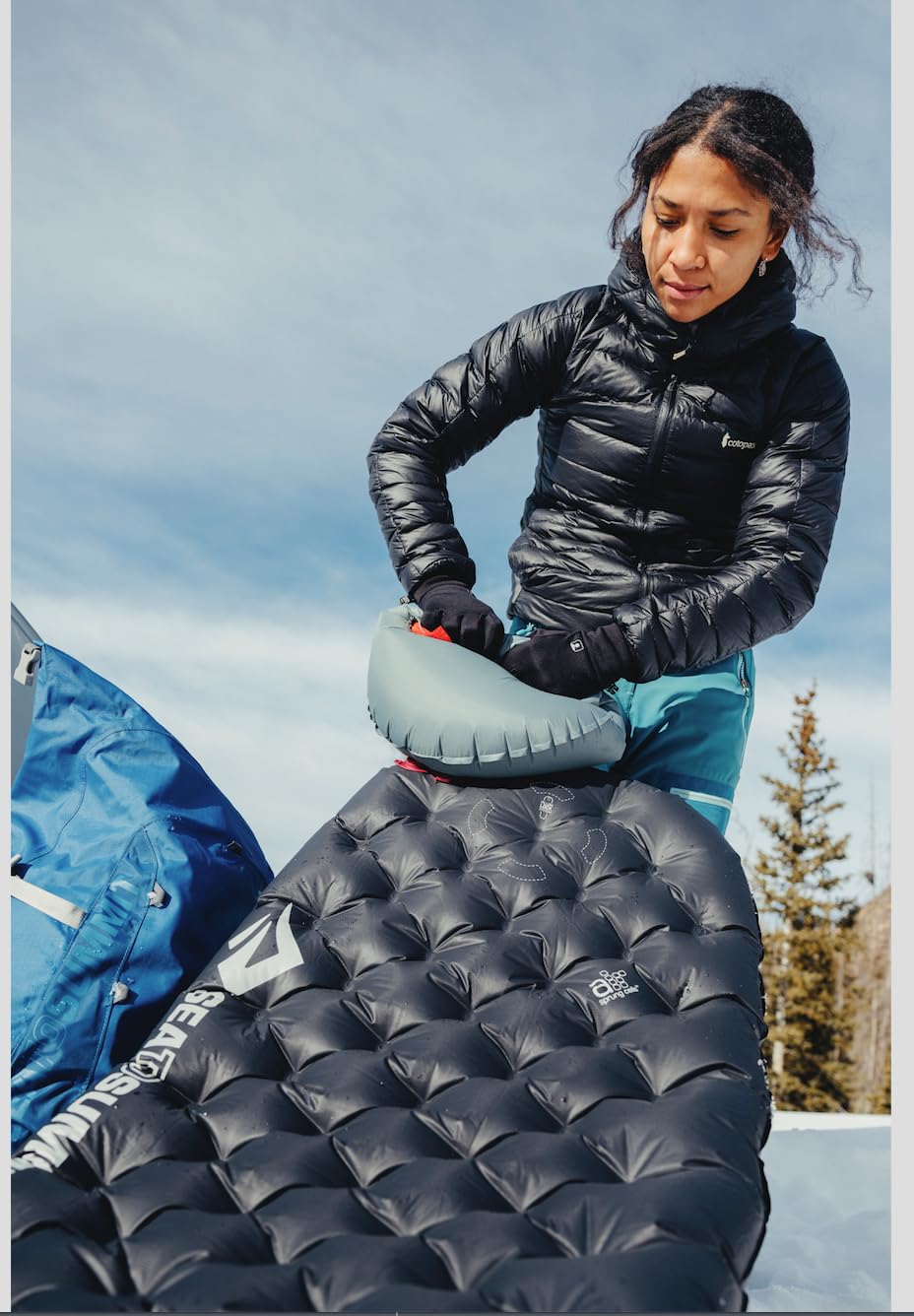 Sea to Summit Ether Light XT sleeping pad in use on cold ground for winter camping warmth.
