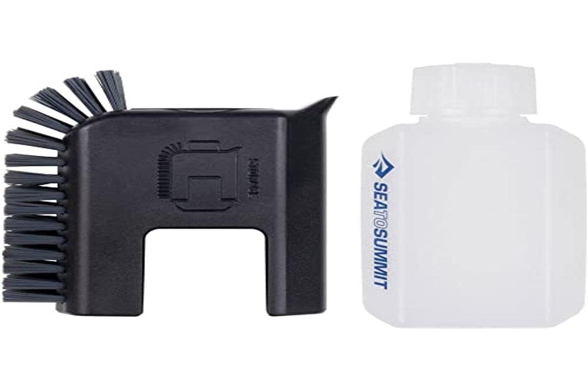 Sea to Summit kitchen brush and soap in black for quick, efficient dish cleaning.