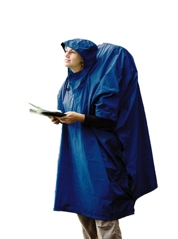 Sea to Summit poncho royal blue packed in the stuff sack for compact travel.