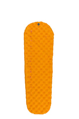 Sea to Summit ultralight insulated sleeping pad folded compact for backpacking comfort.