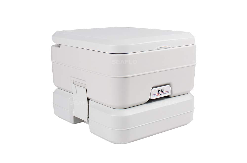 SEAFLO portable toilet during camping setup highlighting 2.6 gallon capacity