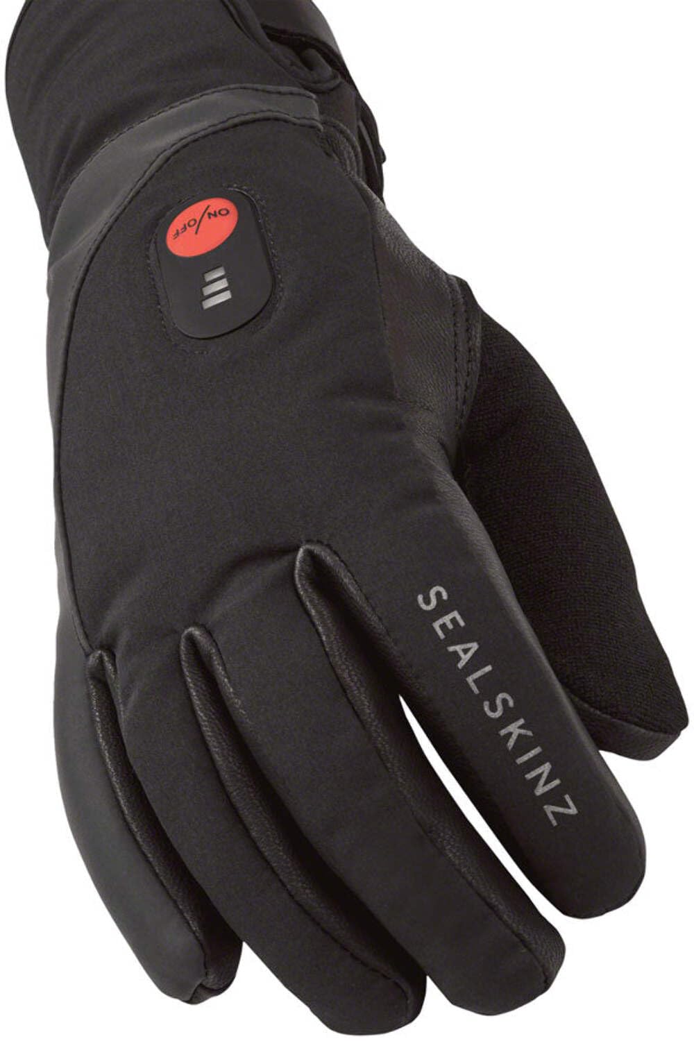 Sealskinz Upwell heated glove in action, staying dry and warm on rides